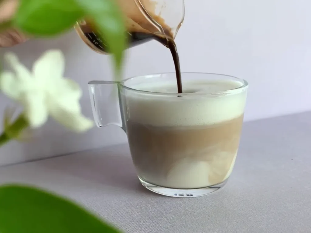 pouring coffee over Brown sugar latte