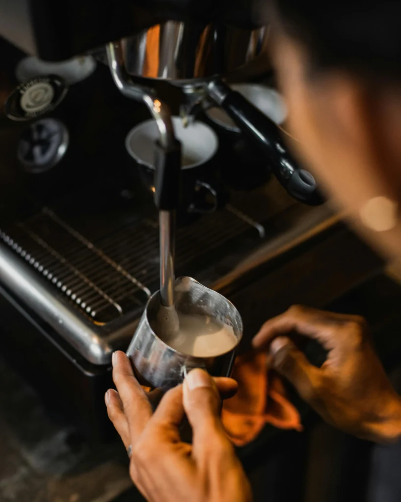 Frothing the milk for mocha cappuccino recipe
