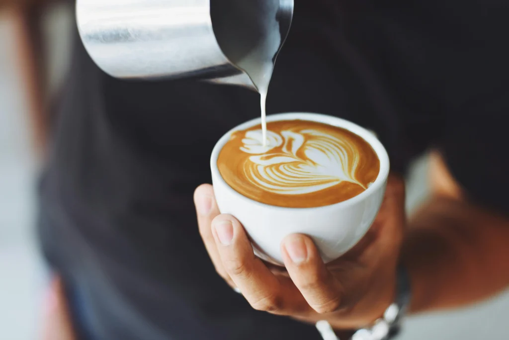 Making latte art for mocha cappuccino