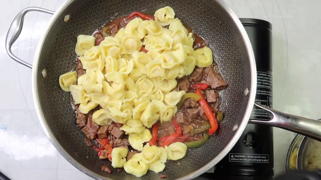 Best Cheesesteak Tortellini For Quick One-Pan Dinner making of Cheesesteak Tortellini